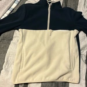 blue and white quarter-zip